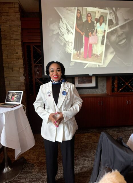 woman in white jacket and black outfit